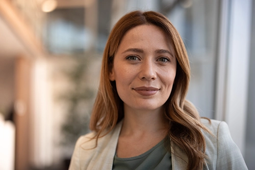 woman smiling hiring redhead